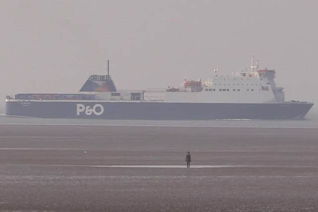 A P&O ferry sailing past Crosby beach after leaving the Port of Liverpool (PA)