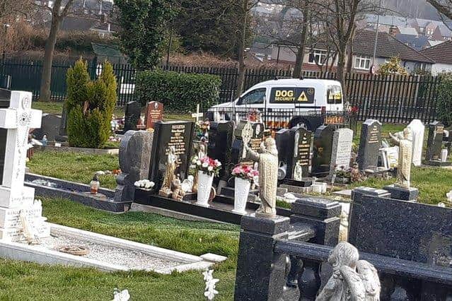 A security van parked near the Willy Collins memorial at Shiregreen Cemetery, Sheffield