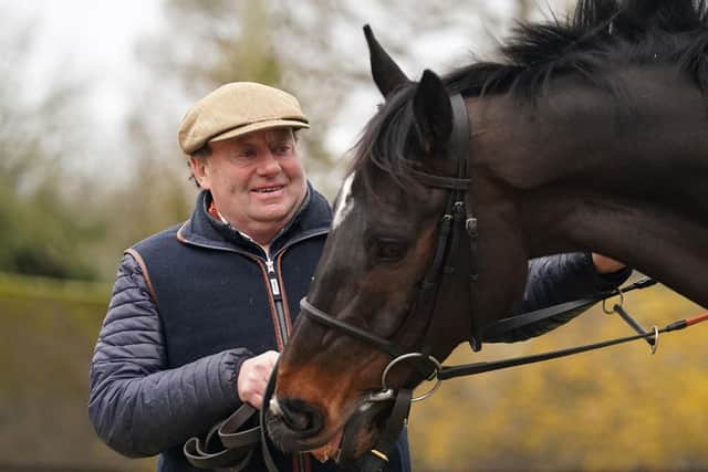 File photo dated 21-02-2022 of Nicky Henderson and Shishkin. Shishkin is expected to put his Cheltenham disappointment behind him with an outing in the Celebration Chase on the final day of the season at Sandown.