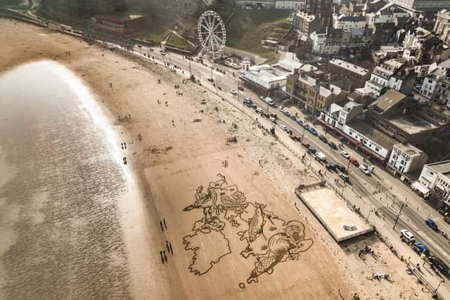A huge sand drawing on Scarborough beach has been created to highlight young people's alarm at the loss of wildlife in the UK. UK Youth for Nature joined forces with Sand In Your Eye, RSPB and others, to create a giant image in the sand depicting an oak leaf, a curlew, a salmon, and a beaver in the shape of the UK.