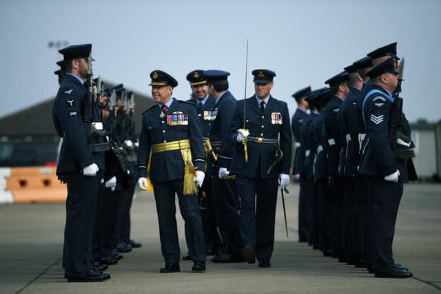 Ceremony to mark the disbandment of 100 Sqn based at RAF Leeming.
Air vice-marshal Ian Duguid inspects the parade.
Picture : Jonathan Gawthorpe