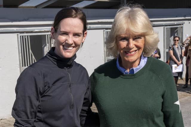 The Duchess of Cornwall meets stable jockey Rachael Blackmore (left) at Henry de Bromhead's Stables in Knockeen during her visit with the Prince of Wales to Waterford in the southeast of the Republic of Ireland.
