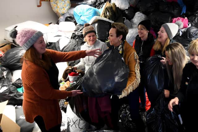 Christa Ackroyd helps out with those taking aid to Ukraine in Halifax.