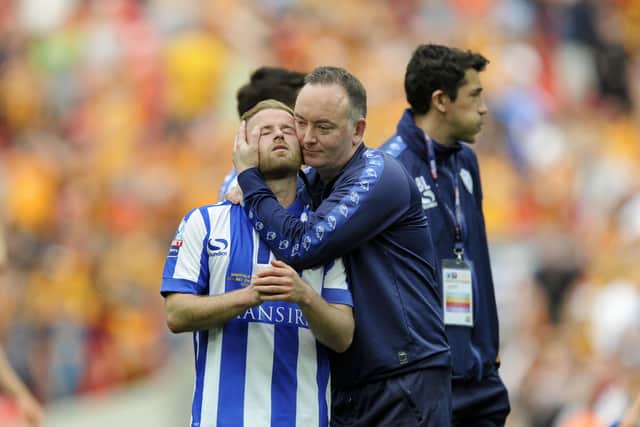 Barry Bannan consoled by Paul Smith after the 2016 play-off final defeat (Picture: Steve Ellis)