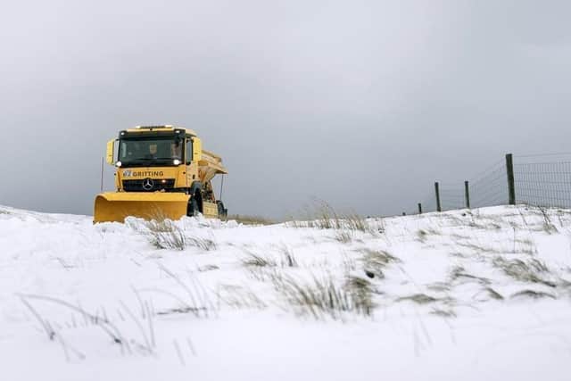 A snow plough on the Buttertubs Pass near Hawes, North Yorkshire, in February
