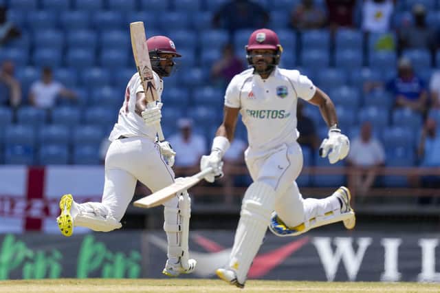 Easy does it: West Indies' captain Kraigg Brathwaite, left, celebrates the winning run, in partnership with John Campbell. (AP Photo/Ricardo Mazalan)