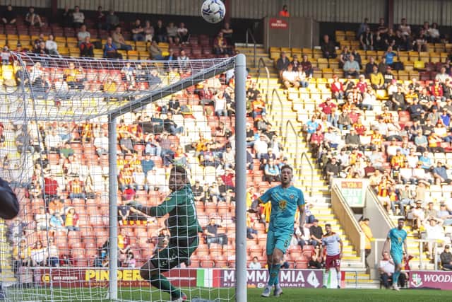 Bradford City's Gareth Evans watches as his effort is tipped onto the bar and over. Picture: Tony Johnson