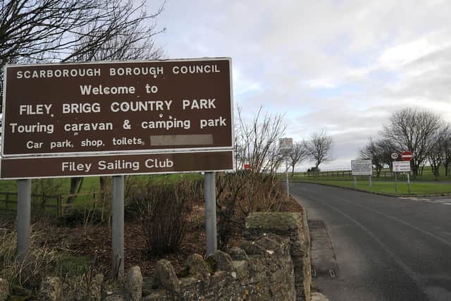 The man was walking along Filey Brigg, in Filey Country Park, when he was struck by the paraglider.