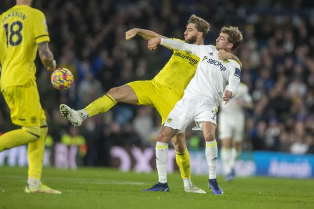 CAMEO ROLE: Leeds United's Patrick Bamford grapples with Brentford
's Charlie Goode. 
Picture: Tony Johnson