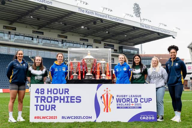 Courtney Winfield-Hill and Lois Forsell (RLWC Ambassador) pictured alongside members of Leeds Rhinos' Netball and Leeds Beckett as part of the Rugby League World Cup 48 Hour Trophy Tour at Headingley. Picture by Will Palmer/SWpix.com