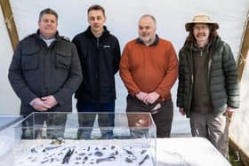 Detectorists Simon Richardson and John Benfield are pictured with Stamford Bridge Heritage Society’s archaeologist Peter Makey and chaiman Brian Birkett. Photo Liam Norman