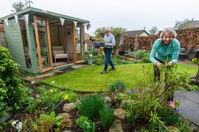 Pictured David and Jane Muir, one of a number of home owners opening their garden to the public. Writer: James Hardisty