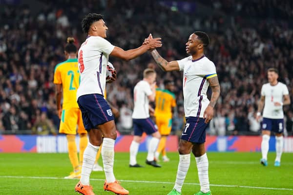 England's Ollie Watkins (left) celebrates with Raheem Sterling after scoring their side's first goal of the game during the international friendly match at Wembley Stadium, London. Picture date: Tuesday March 29, 2022. PA Photo. See PA story SOCCER England. Photo credit should read: Adam Davy/PA Wire.  RESTRICTIONS: Use subject to FA restrictions. Editorial use only. Commercial use only with prior written consent of the FA. No editing except cropping.