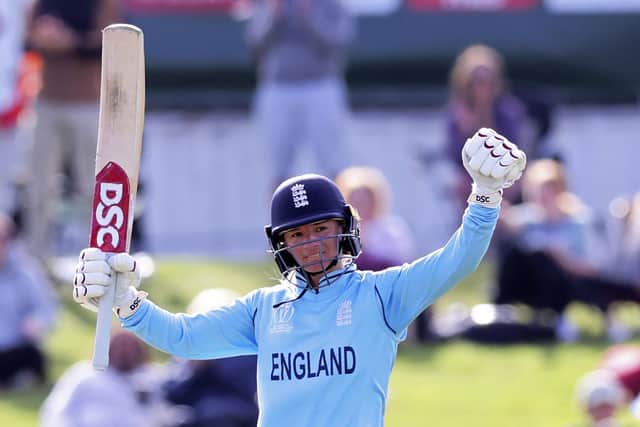England's Danielle Wyatt celebrates making 100 runs against South Africa in Christchurch Picture: Martin Hunter/Photosport/AP