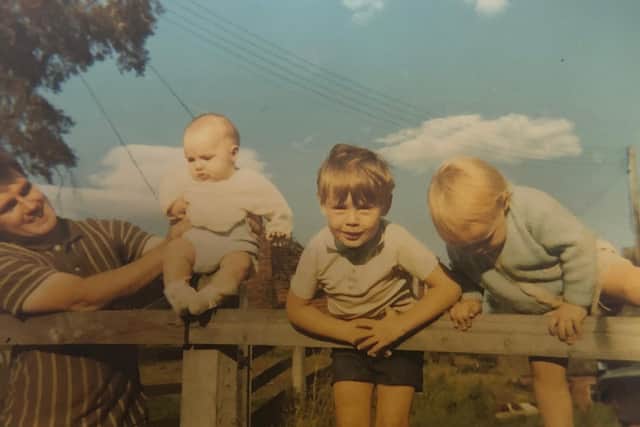 Pictured (left to right) Brothers Dave, Rob, and Richard Nicholson as boys growing up on Cannon Hall Farm with their dad Roger