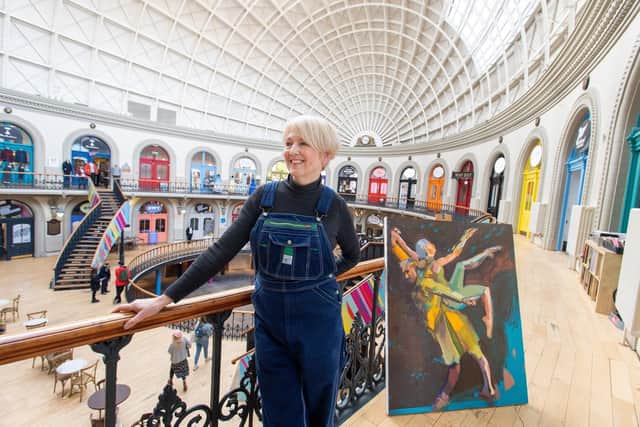 Chris Eastham with her works at the Coles Gallery in the Leeds Corn Exchange
