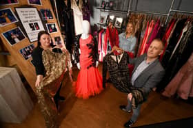 Jane McDonald has donated some of her glamorous dresses to Wakefield Hospice. From left to right: Keeley Harrison (Fundraising Manager), Santa Gindra (Ebay Assistant) and Matt Berry (Retail Operations Officer)