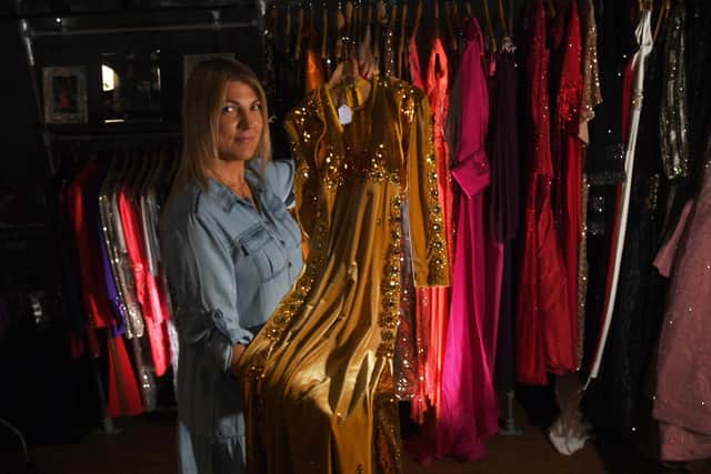 The dresses were previewed at the Wakefield Hospice retail shop in the Ridings Shopping Centre. Pictured is eBay assistant Santa Gindra (Photo: Simon Hulme)