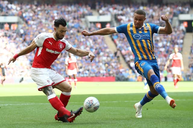 THAT WAS THEN: Carlton Morris (right) in action for Shrewsbury Town, battling for the ball with Rotherham United's Richard Towell during the 2018 League One Final at Wembley Picture: John Walton/PA
