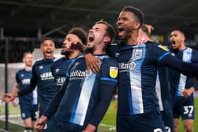 CELEBRATIONS: Huddersfield Town's players show their relief