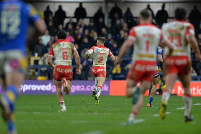 Tommy Makinson on his way to scoring St Helens' third try.  Picture Bruce Rollinson