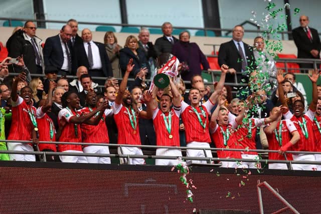 CHAMPIONS: Rotherham United captain Richard Wood lifts the Football League Trophy after a very hard-fought final