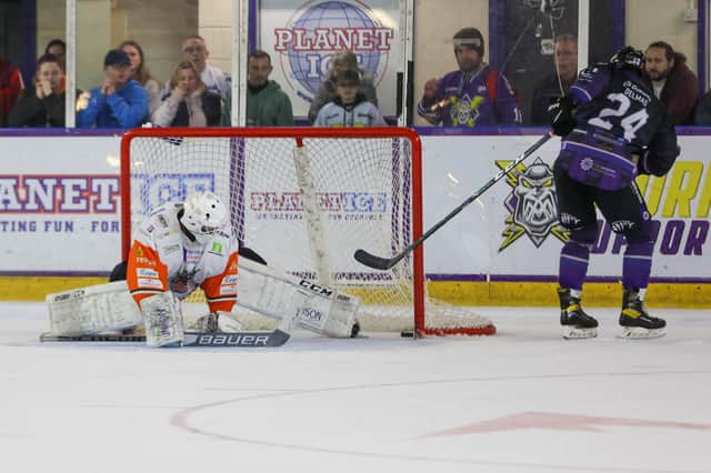 Noah Delmas breaks the deadlock in the shoot-out at Altrincham to give Manchester Storm the win over Sheffield Steelers. Picture: Mark Ferriss/EIHL.