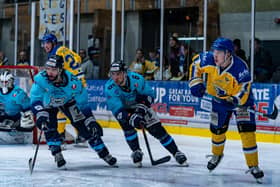 Leeds Knights Kieran Brown(far right) comes under pressure from Sheffield Steeldogs pair Matt Bissonnette (left) and Ben Morgan. Picture courtsy of Oliver Portamento.