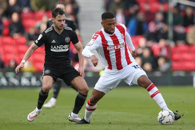 Stoke City's Tyres Campbell and Sheffield United's George Baldock during the Sky Bet Championship match at the bet365 Stadium, Stoke. (Picture: PA)
