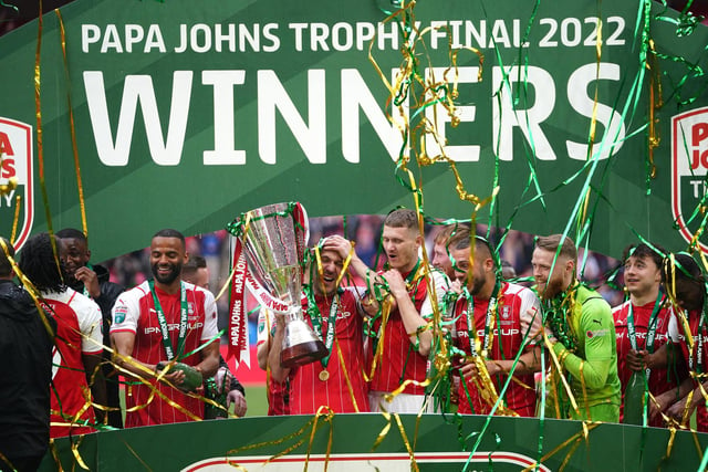 Rotherham players celebrate with the trophy on Sunday.