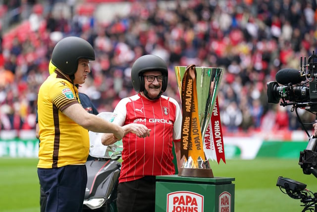 Sutton United fan Tim Vine and Rotherham United fan Paul Chuckle with the trophy before the Papa John's Trophy final at Wembley Stadium