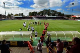 Teams run out on to the Bootham Crescent pitch for the game between York City and FC United of Manchester in August 2017. Picture: Bruce Rollinson.