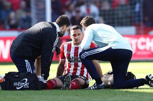 Sheffield United's Billy Sharp picks up his injury. Picture: Darren Staples / Sportimage