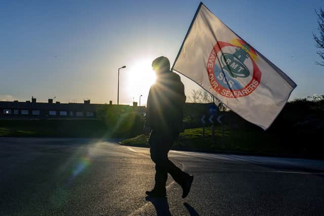 People take part in a demonstration against the dismissal of P&O workers at the Port of Liverpool on March 31, 2022. Picture: Peter Byrne/PA Wire.