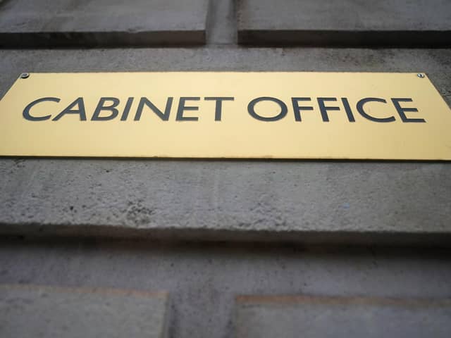 A sign outside the Cabinet Office in London (PA)