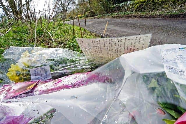 Tributes left at the scene in Harewood Road in Holymoorside.