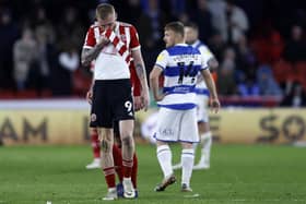 ILL: But Sheffield United's Oli McBurnie was determined to face Queens Park Rangers