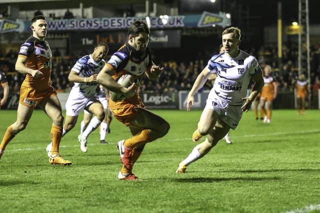 Castleford Tigers 'dangerman' Jake Mamo on his way to scoring against Toulouse last time out. Picture: Simon Hall.