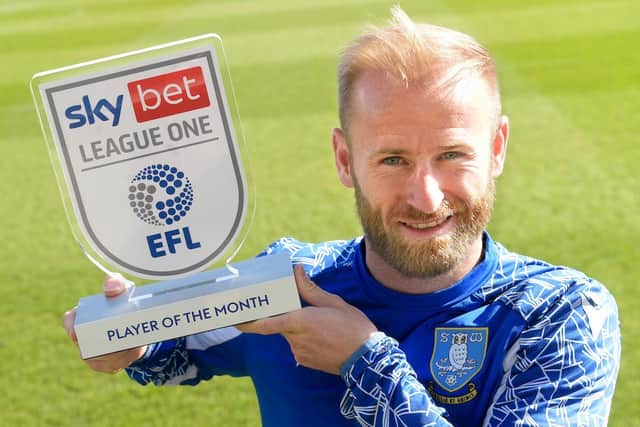 COMMITMENT: Sheffield Wednesday captain Barry Bannan with his award