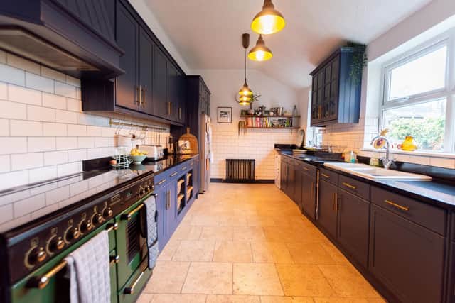 The kitchen that was in the house was still in good condition but the Cotterells have had it spray painted and tiled the wals with metro tiles