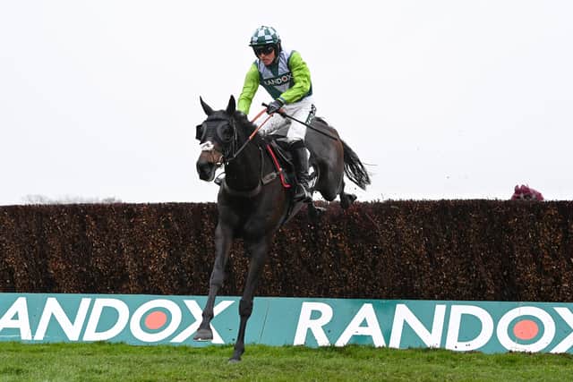 Double up: Harry Cobden on Clan Des Obeaux clear the last to win the Betway Bowl Chase for the second year running at Aintree. (Photo by Shaun Botterill/Getty Images)