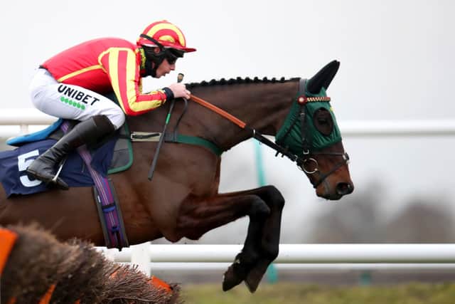 Top Ville Ben ridden by jockey Alain Cawley clears a hurdle on their way to winning the Cazoo Hurdle during day one of The Winter Million Festival at Lingfield Park Racecourse, Surrey. (Picture: Simon Marper/PA Wire)