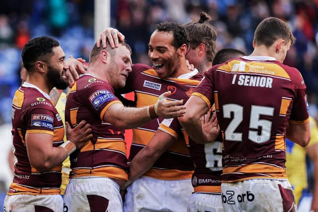 CONFIDENT: Huddersfield Giants' Josh Jones, centre, is expecting a tough test against Hull FC today.  Picture: Alex Whitehead/SWpix.com