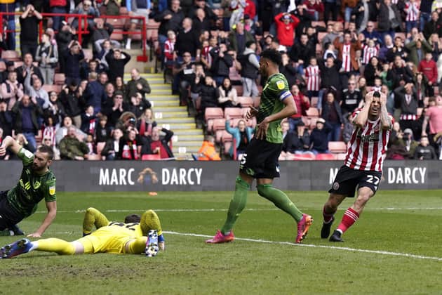 Morgan Gibbs-White of Sheffield Utd (right) shows his frustration after missing a chance against Bournemouth at Bramall Lane. Picture: Andrew Yates/Sportimage
