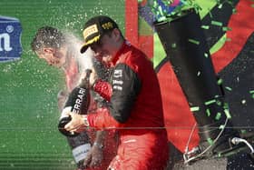 Ferrari driver Charles Leclerc of Monaco sprays champagne on the podium after winning the Australian Grand Prix in Melbourne Picture: AP/Asanka Brendon Ratnayake