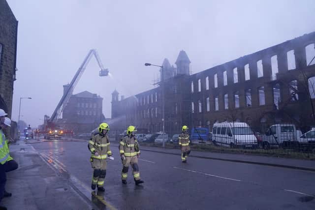 Firefighters tacking the blaze at Dalton Mills, Keighley. Photo: Danny Lawson/PA Wire