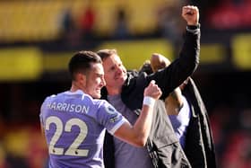 Jack Harrison and Jesse Marsch, manager of Leeds United, celebrate with fans after their side's victory  at Watford. (Photo by Alex Morton/Getty Images)