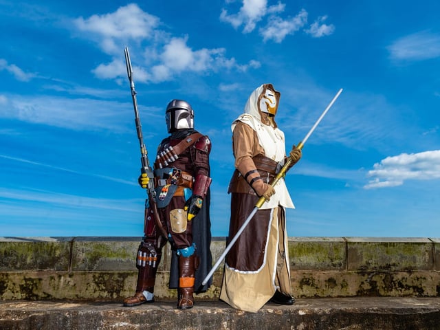 Wilson Whitley, dressed as Mandalorian, and his wife Tammy, dressed as a Jadi Guard, members of Mos Eisley Misfits