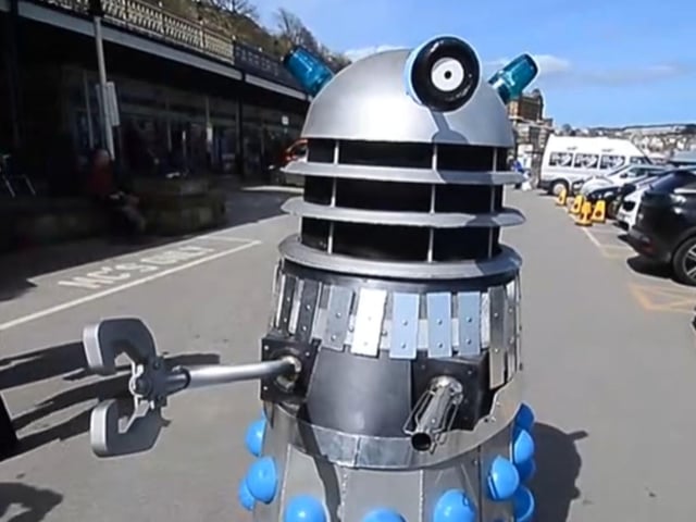 A Dalek terrifies passers by on Scarborough seafront