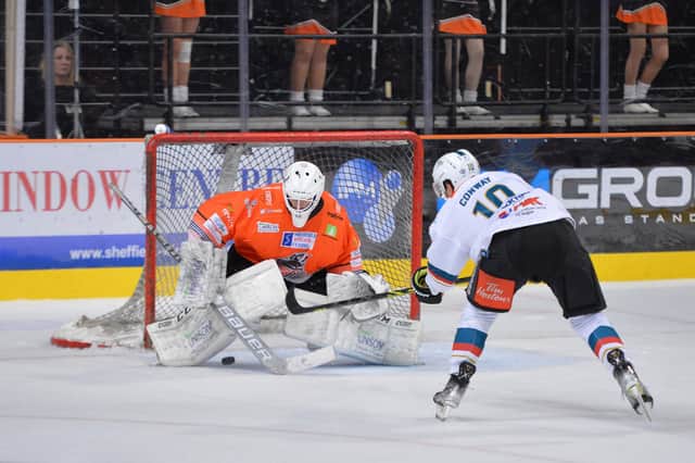 KILLER BLOW: Scott Conway scores the all-important shoot-out attempt to confirm Belfast Giants as Elite League champions. Picture: Dean Woolley.